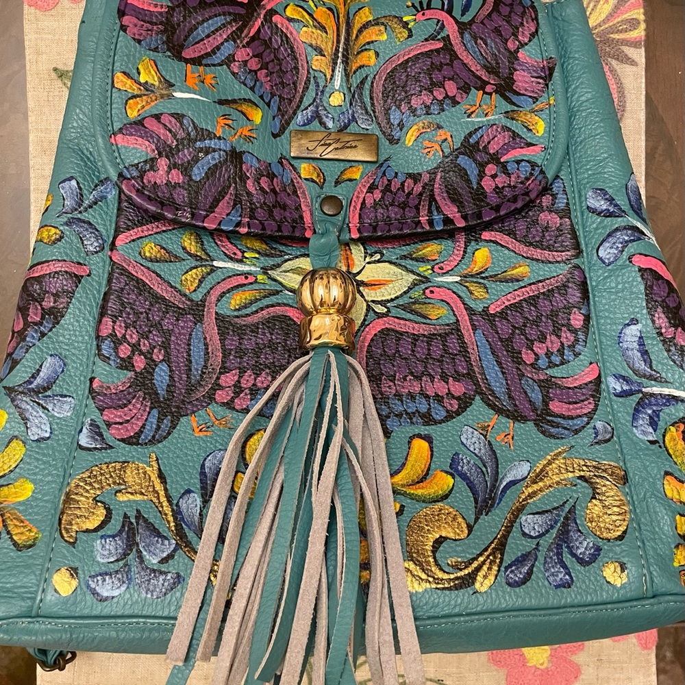 Artisan made hand painted leather backpack